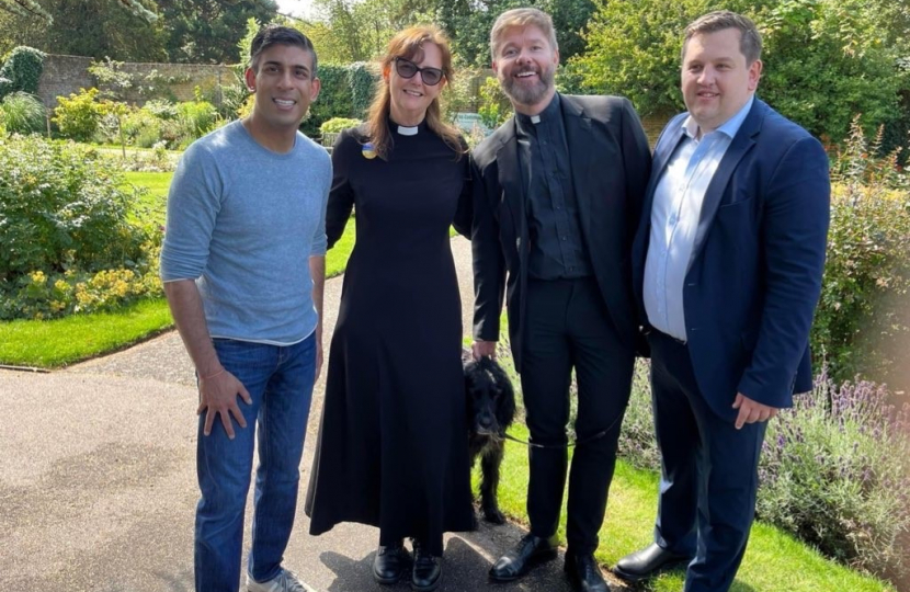 Prime Minister Rishi Sunak with Louie French and community volunteers